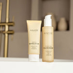 Deep Cleanse bundle with Hydrating Cleanser and Gentle Exfoliator placed on the side of a bathtub in a sand-colored bathroom, creating a calming spa-like feel.